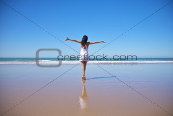 happy white dress woman at Castilnovo beach
