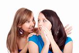two young woman whispering gossip - isolated on white