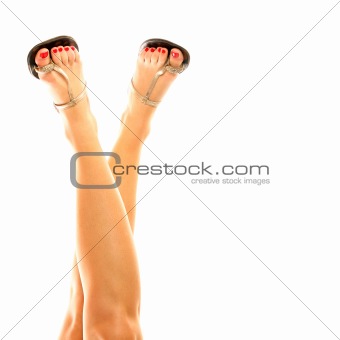 Female legs in sandals
