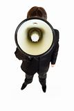 Businessman standing in front of camera and speaking into megaphone
