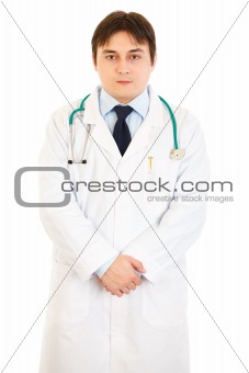 Confident young medical doctor in uniform with stethoscope
