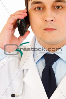 Medical doctor talking on mobile phone
