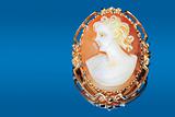Antique cameo on blue