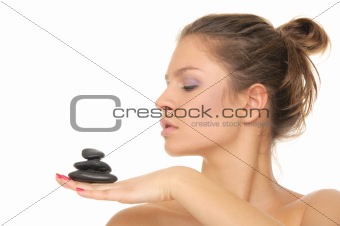 woman holding stones on the palm of your hand