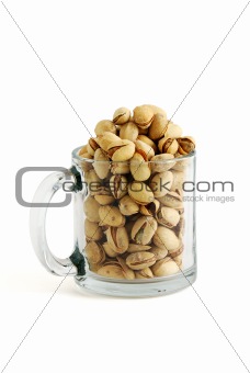 Salted pistachios in beer mug