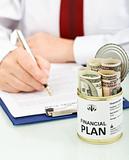 Concept of business man making financial plan - closeup