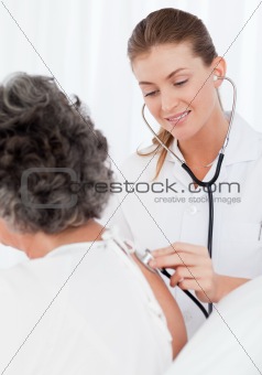 Nurse taking care of her patient