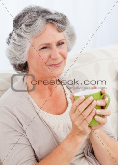Senior drinking a cup of tea