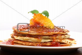 Pancakes with oranges