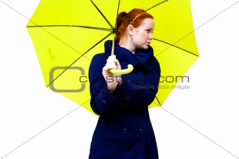redhead young woman holding an  umbrella