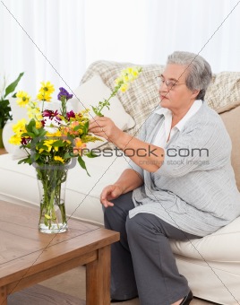 Senior woman with flowers 