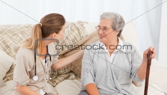 Nurse talking with her patient