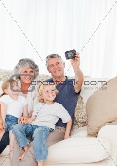 Family taking a photo of themselves 