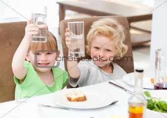 Children toasting with their drink