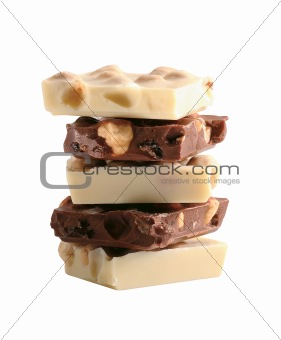 black and white chocolate with nuts isolated on white