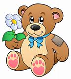 Cute teddy bear with flower