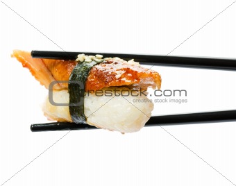 Sushi with chopsticks isolated over white background
