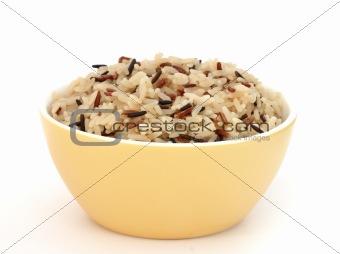 Yellow bowl with cooked rice of various types