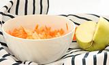 Grated  carrot and apple in a bowl