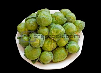 Brussels cabbage isolated over black
