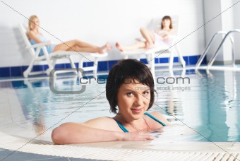 Young woman near pool