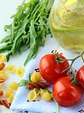 Pasta ingredient olive oil, basil, tomato