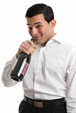 Alcohol abuse man drinking from wine bottle