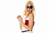 Trendy woman with sunglasses holding red handbag