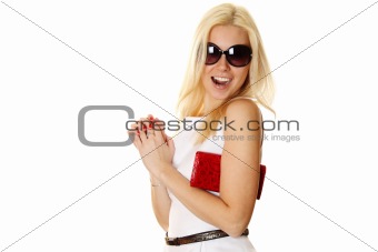 Trendy woman with sunglasses holding red handbag