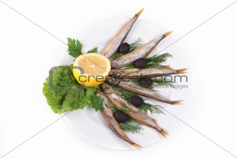 kipper fish on composition with vegetables