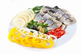 fish on plate with vegetables