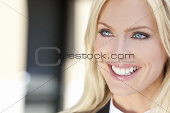 Portrait of Beautiful Young Blond Woman With Blue Eyes