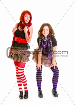 Two young girls  posing together
