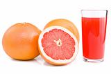 Grapefruits and glass of juice.