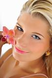Beautiful young fresh female face with healthy skin