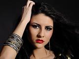 Beautiful woman portrait with bright make-up and long black hair