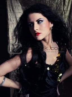 Beautiful model woman with long black healthy hair