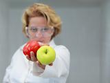 Female scientist offering natural food