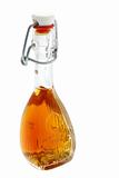 Bottle of alcoholic beverage with honey