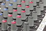 Closeup of audio mixing console