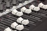 Closeup of audio mixing console