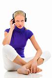 portrait of a young caucasian woman with casual clothing with headphones
