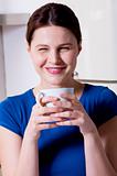woman drinking a cup of tea