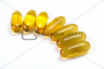 Many colorful medical capsules and vitamins as a background