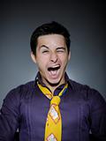 Expressions Handsome man in funny shirt and tie laughing