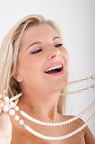 pretty woman face with pearl necklace