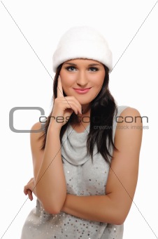 Expressions. Beautiful winter girl in a hat smiling. isolated