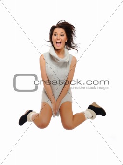 Expressions - Beautiful funny winter woman jumping and screaming