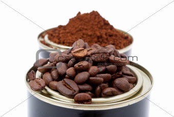 Coffee beans in tin cans