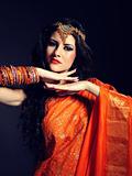 Young beautiful woman in indian traditional sari dress 